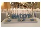 Rent personalized two-tiered Sweet 16 candle holder from the Brat Shack