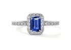 Classic Prong Set Sapphire and Diamond Ring With Halo Design
