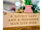 A Lovely Couple Lives Here – Charming Home Sign Décor